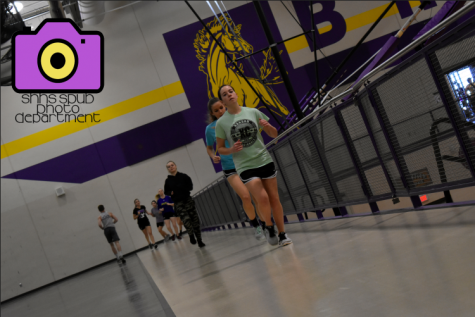 On Mar. 1, Aubri Hatfield, 9, Lexi Dillon, 9, and Libby Bowden, 9, are running for five minutes, walking for two minutes during Elizabeth White, physical education teacher’s, freshman P.E. class. (photo by G. Pinkerton)