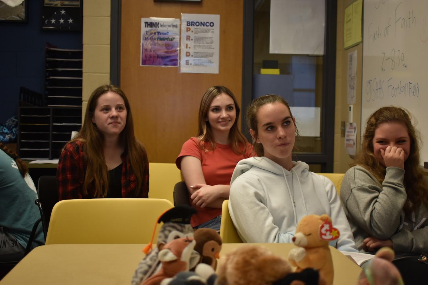 Gracie Campos, Ashley Carlisle, Porscha Stocker, and Kyra Fuchs, 9, all laugh while listening to Paul Young’s, History teacher, lesson on Sept. 25.