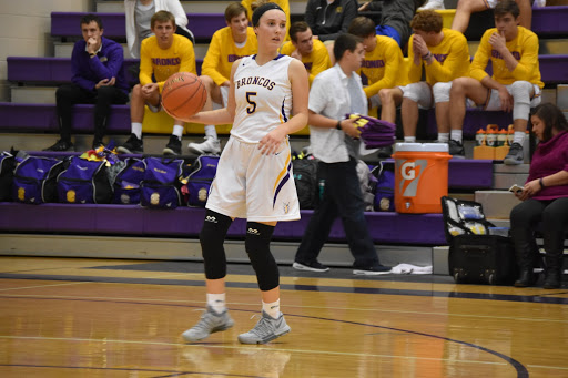 On Dec. 11, Laney Stegging, 12, brings the ball down at their home game against Metro Academy. 