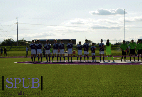 Before the start of the game, the new varsity starting lineup for boys soccer takes the field for the first time of the season. (Photo by B.Gulley)