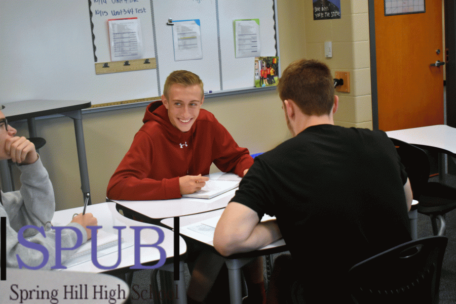 During College Prep on Oct. 15, Braxton Dixon, Parker Stokes and Zack Sanderson, 12, take notes during class. (Photo by A. Hatfield).