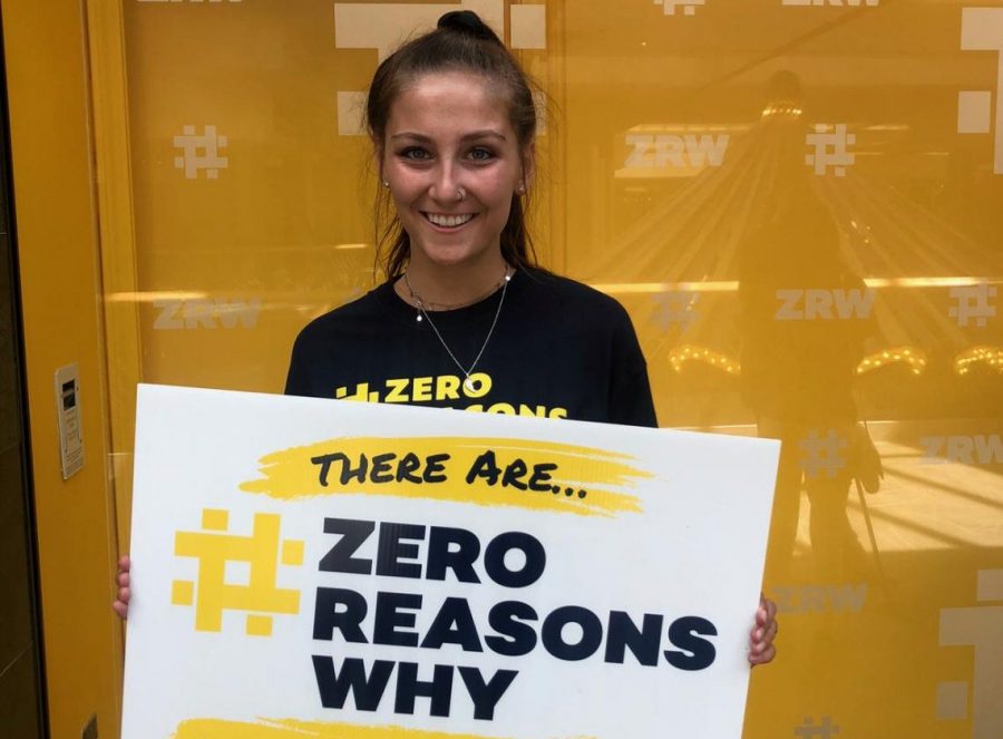 On Sept. 7, holding up her sign at the new #ZeroReasonsWhy Store. This store is aimed at drawing awareness and educating people on mental health  (Photo Submitted by SMckinney).