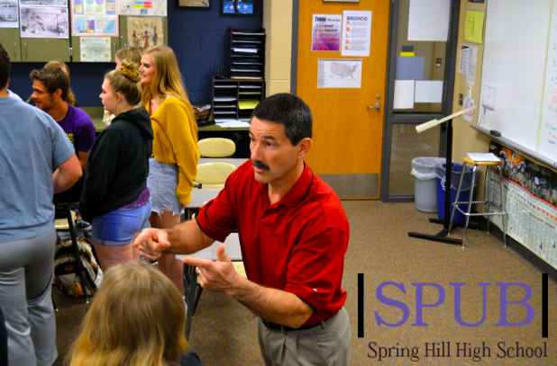 After being a quarterback and pitcher/centerfielder for MidAmerica Nazarene University Paul Young, history teacher, moved on to teaching. However, he carries his love of sports to this day and still coaches baseball (Photo by TDent).