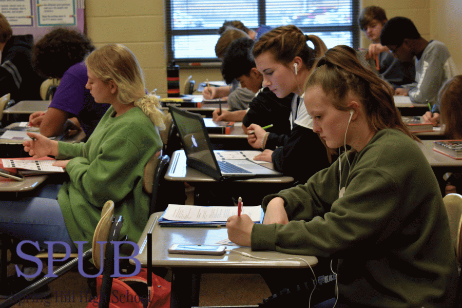 On Nov. 13 during Kelly Edigers, english teacher, fourth hour American Literature class juniors work on a snapchat assignment where they had to draw four snapchat pictures. These posts are based off of the story they had previous finished, The Fall of the House of Usher, (Photo by O. Chrisman).