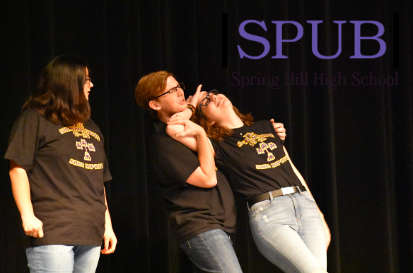 Juniors Logan Trask, Josie Scheener, and Jourdyn Nickel all perform an improv scene during the show. They are part of the Shenanigang; an improv group who has performed at the show for the last two years (photo by I. Williams).
