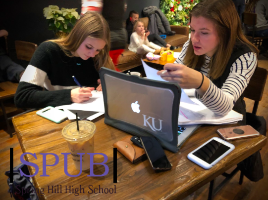 On Dec. 18, Alyssa Hain, 11, and Layla Smith, 11, study for their finals during Cram with Cocoa. Cram with Cocoa is hosted at The Bean on Main Street.  