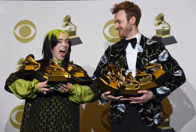 Eighteen year old Billie Eilish and her older brother, Finneas OConnell, holds their five Grammys after the ceremony. Eilish and O’Connell won an award for each of the four major categories (Photo courtesy of Ap photo and Chris Pizzello).