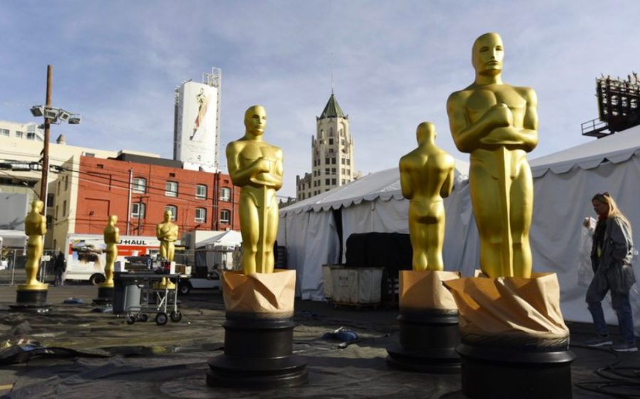 On Feb. 5, Oscar Statues stood outside while Hollywood Boulevard in preparations for the big event on Feb. 9. The Oscars viewership was down for the second year in a row (Photo Courtesy of AP photo and Chris Pizzello). 