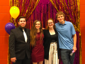 Winter Homecoming groups pose for a photo a week before Valentine’s Day. Dean Diviney, 2019 alum, Olivia Burger, 10, Cheyenne Kanakares, 10,  Saige Bayer, 12 all went together (Photo Submitted by CKanakares).