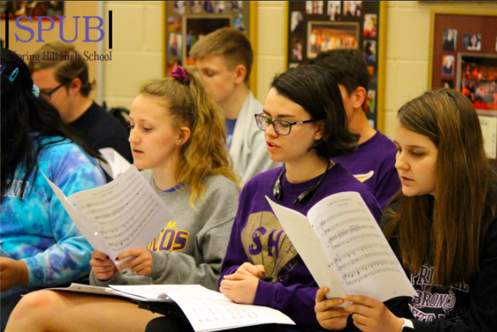 During Georann Witmans 4th hour Madrigals class, on April 26, 2019 Avery Copeland, 11, Maya Sosa, 11, and Abby Waltrip, 11, rehearse their parts for the opening number. Their concert was on May 9th, 2019 (photo by A. Mattox).