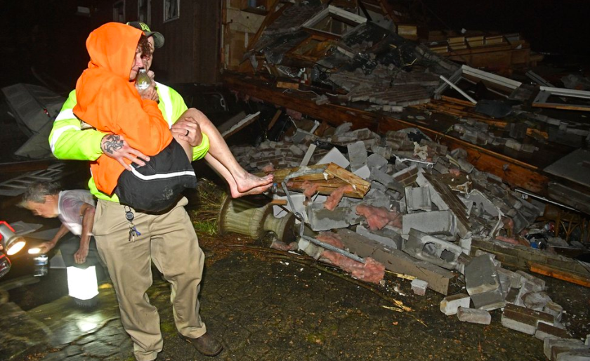 On March 3, after tornados ripped through Tennessee a resuce worker caries Shirley Wallace from her home that collapsed and trapped her under rubble. Tornados become a higher risk come the begging of spring (Photo Courtesy of The Tennessean via AP Photo and Larry McCormack). 