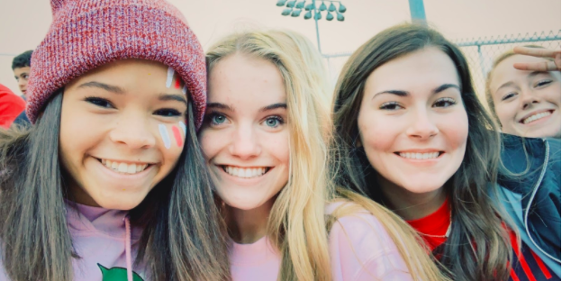 Pre-pandemic, juniors Olivia Amos, Meredith Todd, Emily Dowd and myself enjoy a Pink Out themed home football game. Little did we know our year would be cut short; however, we were grateful to be able to support our school throughout the fall season (photo credit O.Amos, submitted by M.Sutton).
