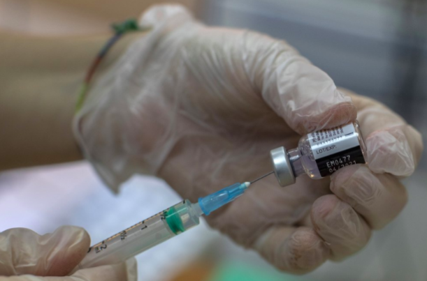 The COVID-19 vaccine could help people stay safe against the virus (photo courtesy of AP News).
