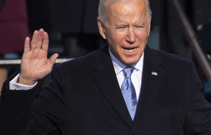 Joe+Biden+being+sworn+in+as+the+46th+president+of+the+United+States+by+saying+the+oath+of+office.+Bidens+first+week+was+marked+by+the+extensive+number+of+executive+actions+he+took+%28Photo+courtesy+of+pool+photo+via+AP+and+Saul+Loeb%29.+