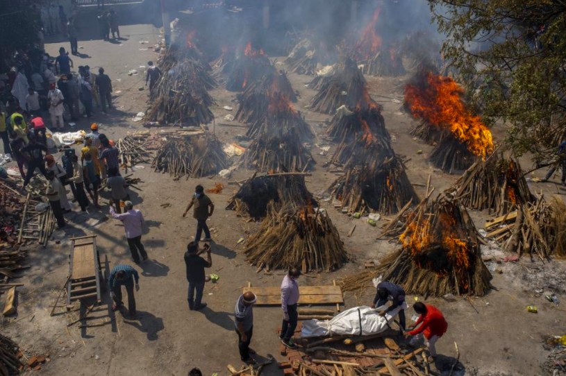 As deaths due to COVID-19 continue to rise in India, the country has found itself having to utilize funeral pyres like the ones pictured here to dispose of their dead (photo courtesy AP News).