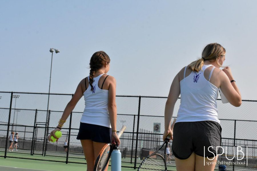 On Sept. 14, the tennis C-team prepares to play in a tennis match.