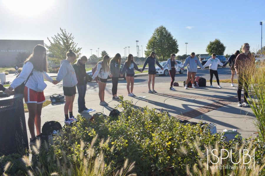 On Sept. 28, FCA members gather at the flag poles for their annual See You at The Pole, praying over our world and our school.