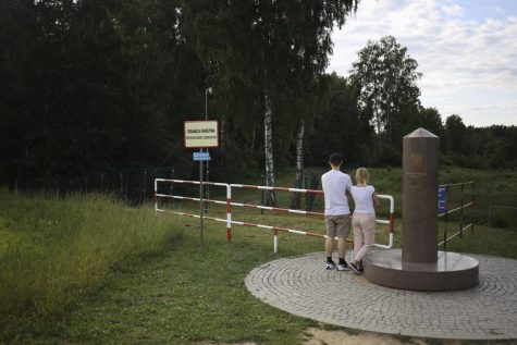 People visiting the border of Russia and Lithuania (photo curtesy AP News).