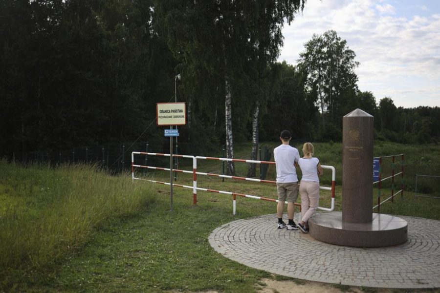People visiting the border of Russia and Lithuania (photo curtesy AP News).