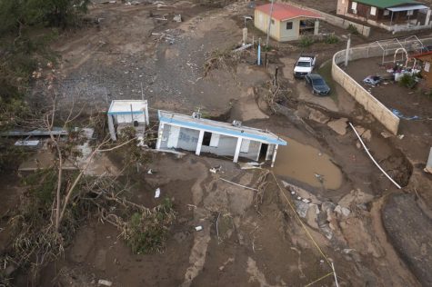 Hurricane Fiona leaves many homes washed into the mud (photo curtesy AP News).