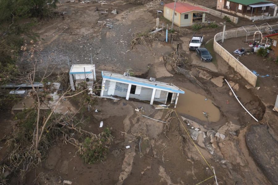 Hurricane Fiona leaves many homes washed into the mud (photo courtesy AP News).
