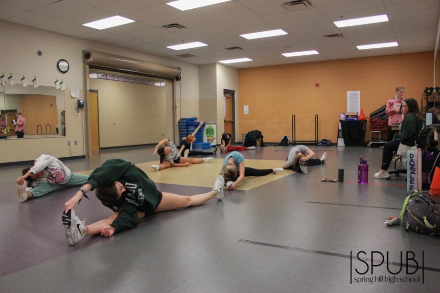 On Sept. 28, the Dazzlers dance team stretches before their dance rehearsal. 