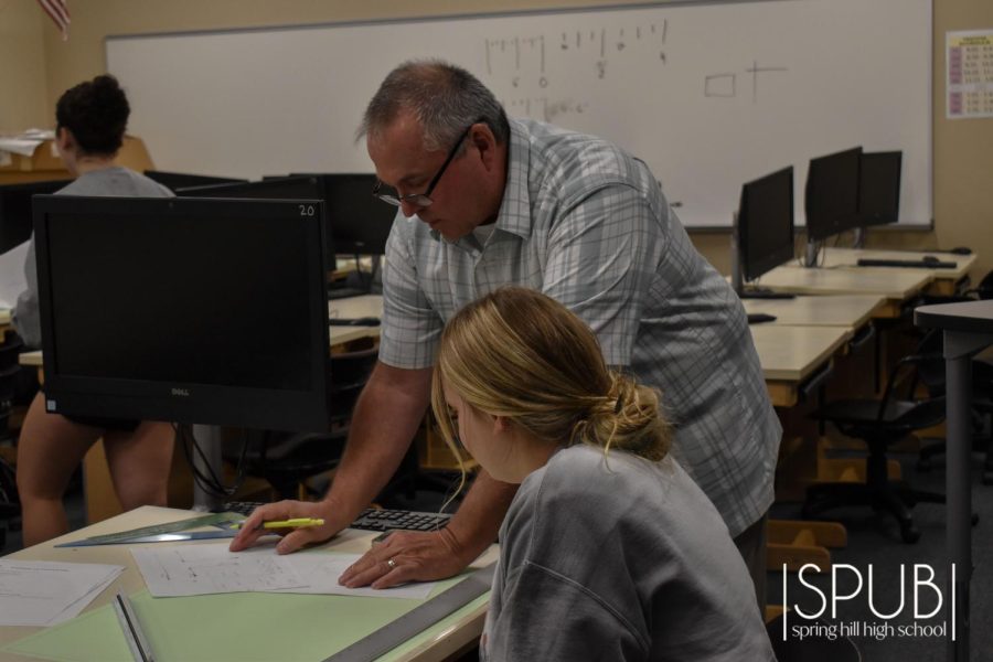 On Oct. 3, David Londene assists his students in his fifth hour drafting/CAD class.