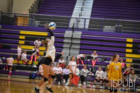 On Oct. 5, the freshman girls volleyball team serves the ball at a home game.