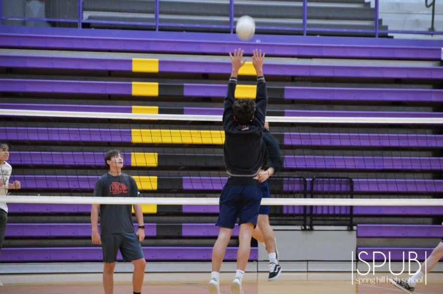 On Oct. 5, Killian Zimmerman, 12, jumps for a volleyball in Jamie Oshels team sports class.