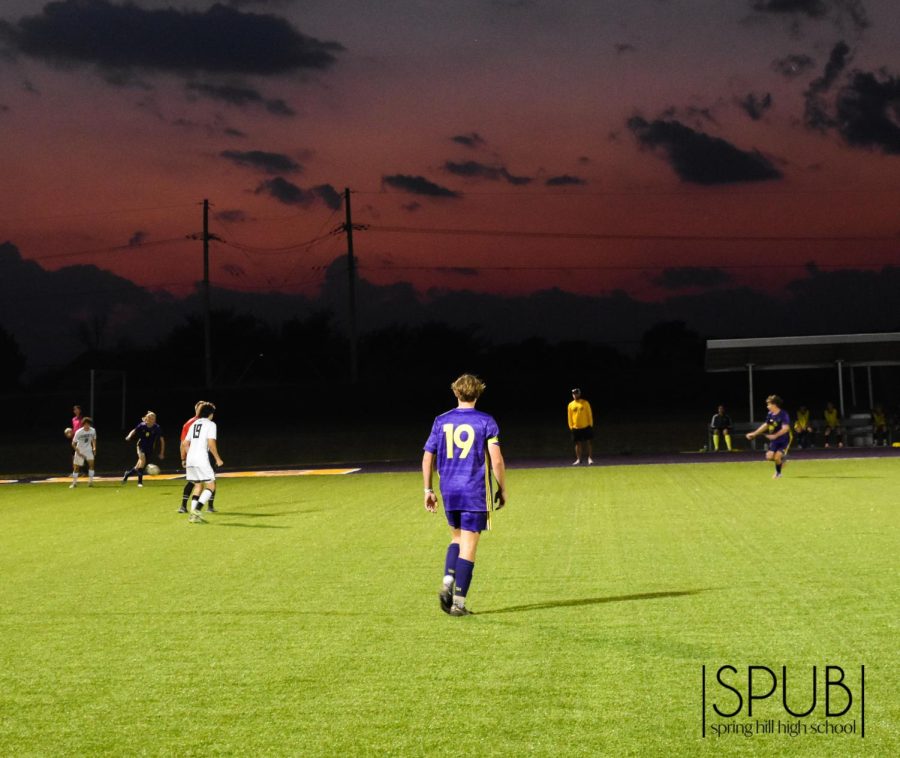 On Oct. 10, Jacob Breuckner, 12, adjusts his position on the field in a varsity soccer game.