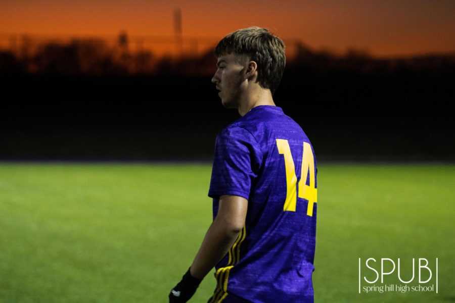 On Oct. 25, Jake Rainforth, 10, positions himself on the field during a varsity soccer game.
