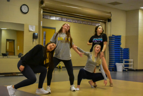 The dazzlers take the time to rehearse (photo by K. Tran).