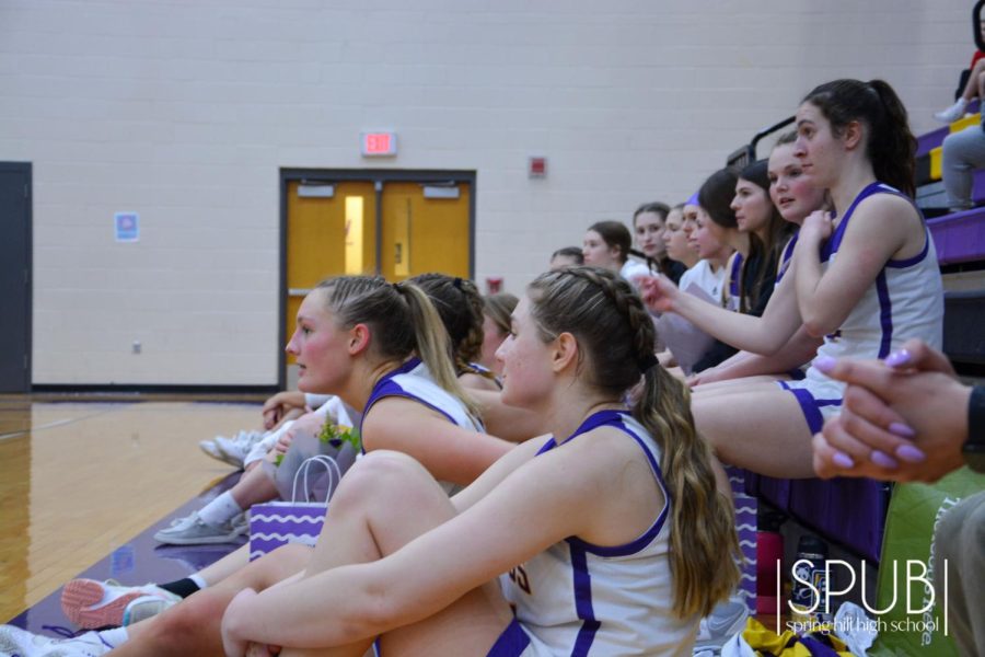 On Feb. 21, the girls basketball team watching their two seniors Jenna Weber and Delaney Hill during senior night.