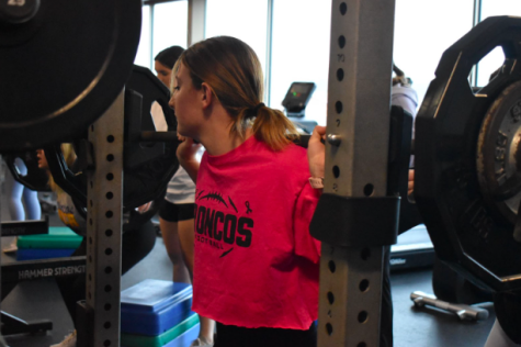 Haylee Whitcraft, 11, participates in weights class.