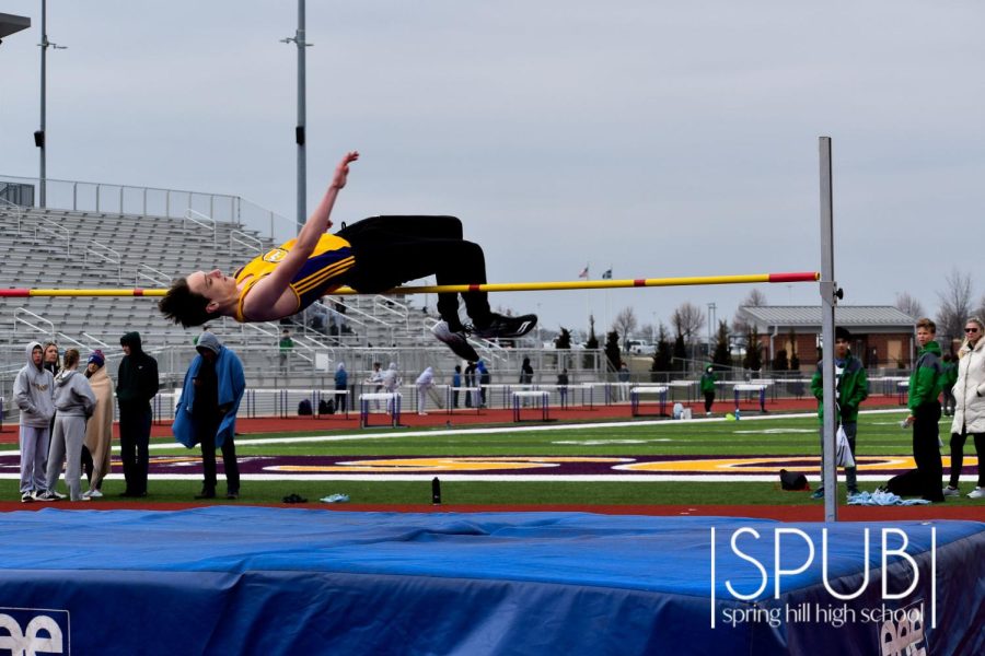 Kellen Swanson, 10, participates in high jump during the track meet.