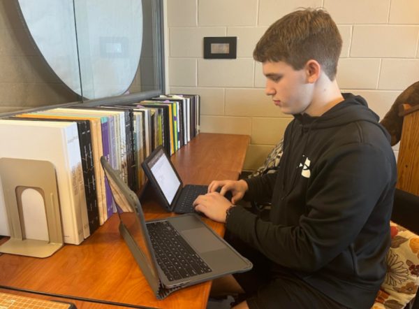 Senior, Caden Bartek, is a TA for Anna Manning and does his homework in his down time. This is a plus when deciding to be a teacher’s aide (K. Tran).
