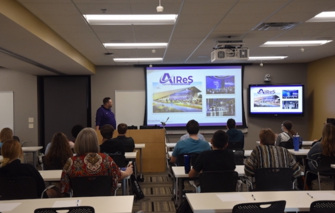  Session two at the KSU campus in Olathe, Kansas. A professor introduces the new AIRES building located in Salina, Kansas to the class. (Photo by A. Watson)