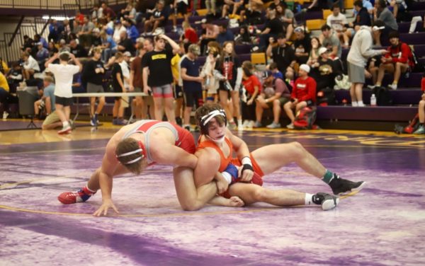Bartek wrestles their opponent at the Belton Tournament. They ended up placing 3rd at this tournament (Photo by R. Jones).