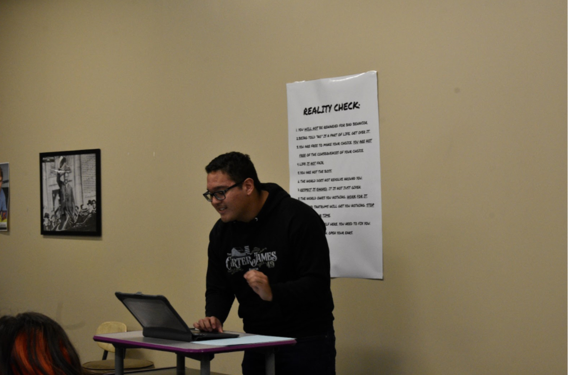 Garcia giving a practice speech in debate on the negative side. They  attend debate practices often, which have helped them grow as a debater (Photo by M. Marmon). 