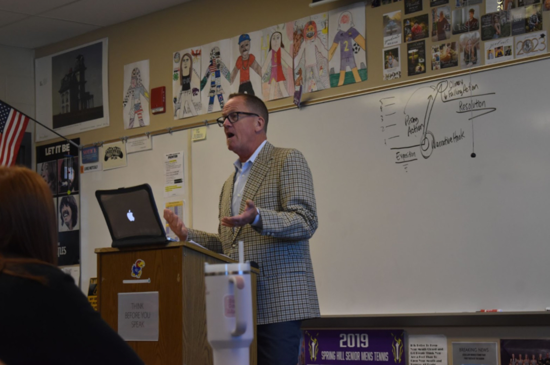 Thomas Sherron, English teacher, addresses his Composition 1 class from his podium at the front of the room. Composition is a college level class (Photo by S. Hatcher). 