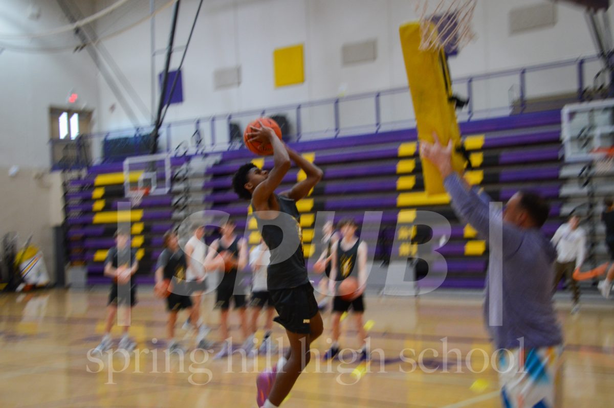 On Dec. 5, Elijah Lacey, 12, runs through a shooting drill during practice. Only the varsity team had practice that day. 