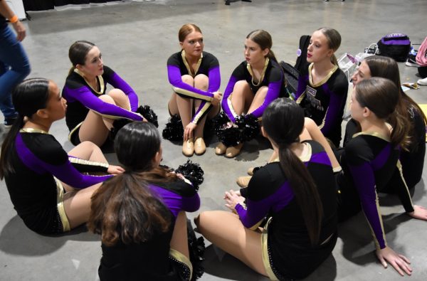 The Dazzlers have a pep talk before going to perform. This was before performing their style routine (Photo by B. Vandertuig). 