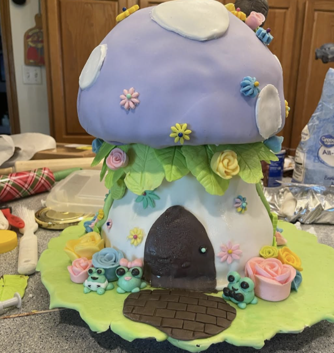 Cake decorating is one of Ingle’s many hobbies. Magical, fairy-like decorations are a common theme for Ingle’s cakes. (Photo provided by M. Ingle) 
