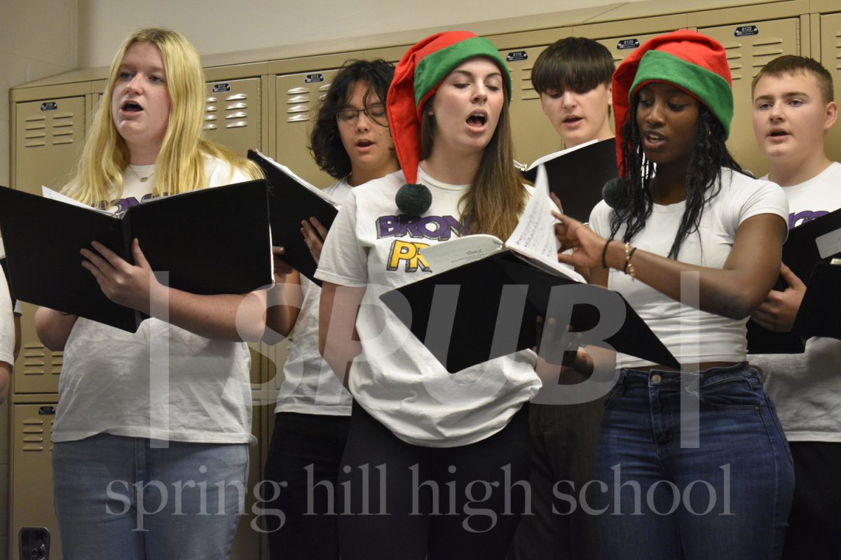 The Madrigals carols throughout the hallways spreading holiday spirit. They also traveled to other schools in the district.