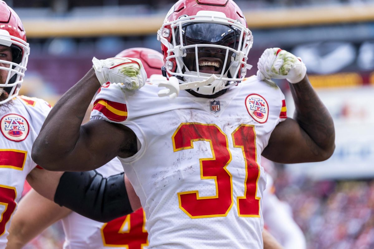 Kansas City Chiefs player celebrates after the a play big play agains the Washington Commanders. The Chiefs went onto win the game and with this win they improved their winning record (Photo by A. Reels).   
