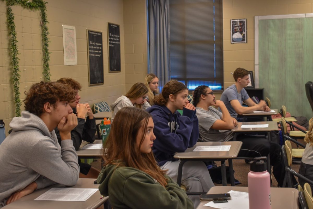 Bates sitting in their seat while listening to Michelle Weltz, English teacher, lectures. AP Lang is one of Bates’ classes this semester (Photo by H. Evans). 