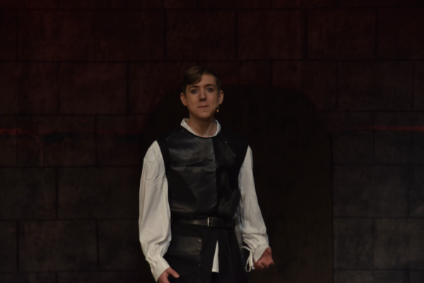 Henry Seitz performs as Lennox in the high school’s production of “Macbeth.” Seitz found a passion for acting when he decided to experiment and join their friends in theater. (Photo by A. Watson)