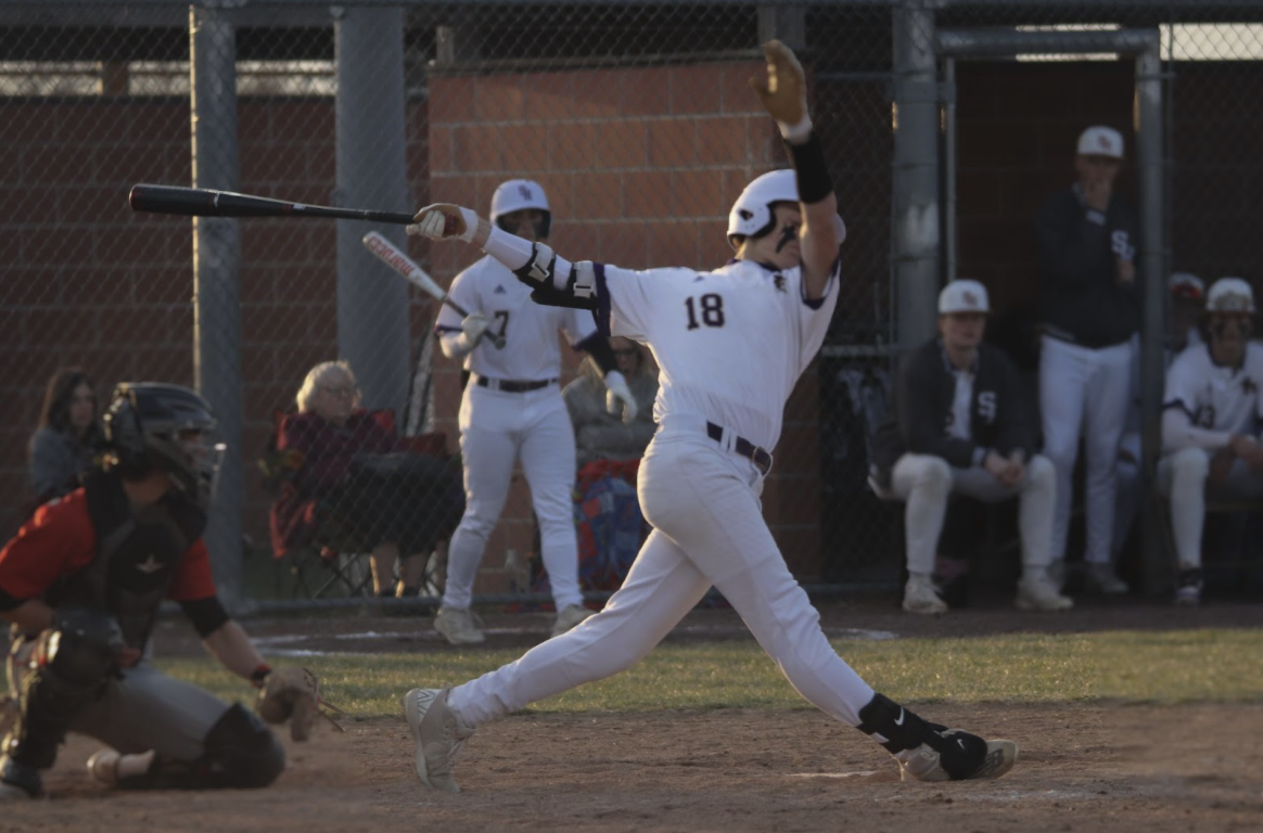 Sam+Harris%2C+9%2C+swings+and+misses+while+at+bat+against+a+Tonganoxi+pitcher+on+Mar.+28.+%28Photo+By+M.+Brown%29