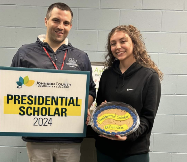 On April 26, a representative from JCCC came to SHHS to present Al-Dugom with the scholarship (Photo provided by Spring Hill High School Facebook). 