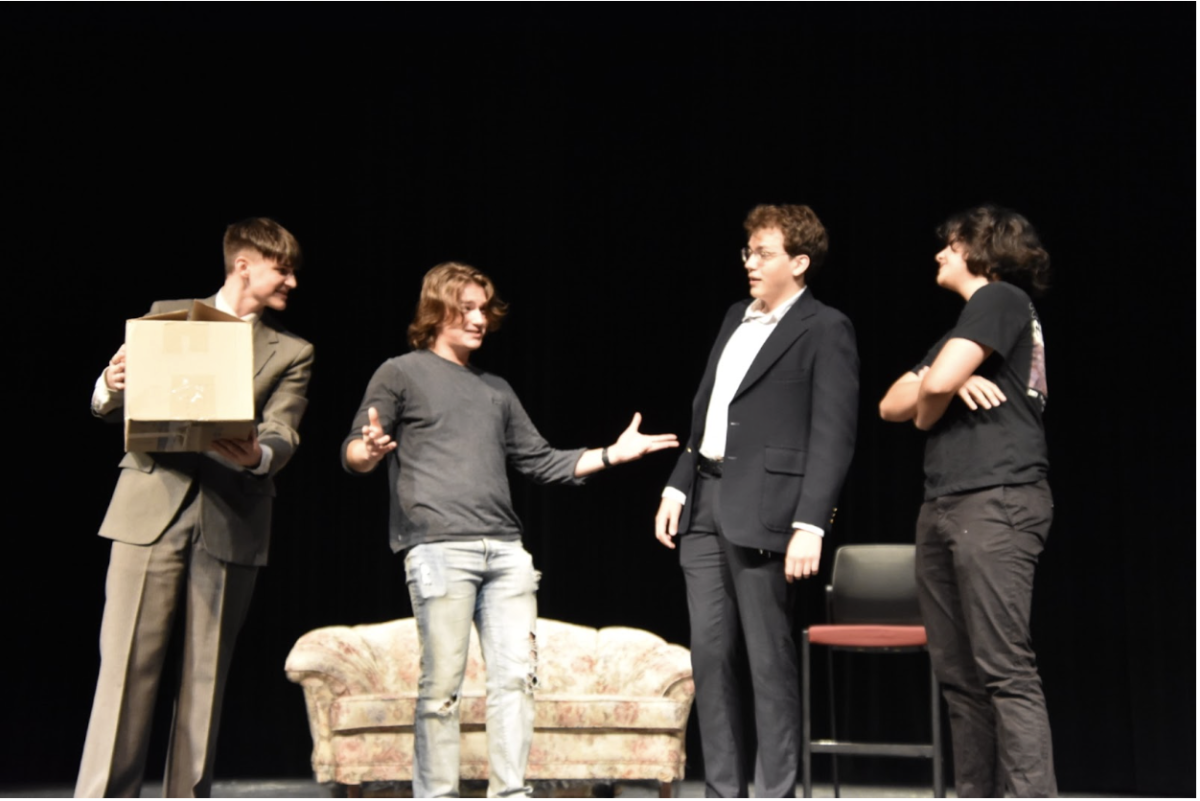 (Left to right) Andon Maddox, 11, Zachary Vasser, 11, Ethan Knust, 12, and Daniel Liang, 11, perform Sweet Tooth from Wonka (2023). (Photo by C. Brewer.)

